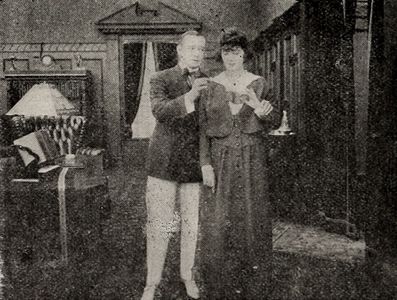 Mae Busch and William Collier Sr. in Better Late Than Never (1916)