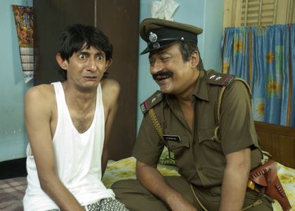 Santilal Mukherjee and Kanchan Mullick in Le Halua Le (2012)