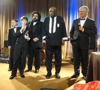 Oscar-Emmy-Golden Globe Winner, Louis Gossett Jr. presents the top Cinerockom Diamond Young Actors Award to Christian Go