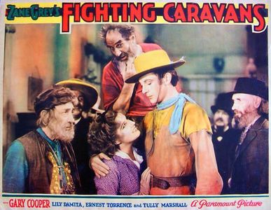 Gary Cooper, Lili Damita, Tully Marshall, and Ernest Torrence in Fighting Caravans (1931)