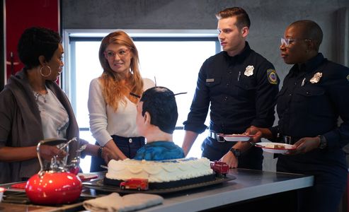 Angela Bassett, Connie Britton, Aisha Hinds, and Oliver Stark in 9-1-1 (2018)