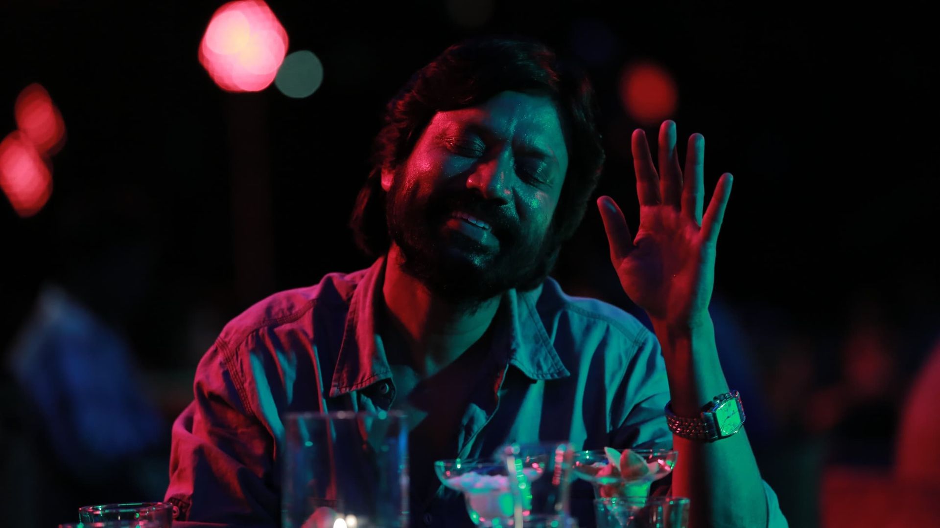 Iraivi background